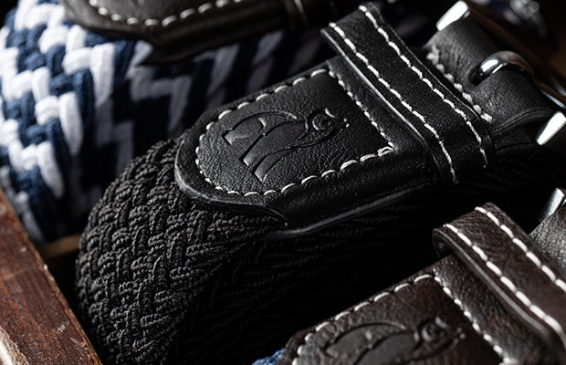 collection of black stretch belts